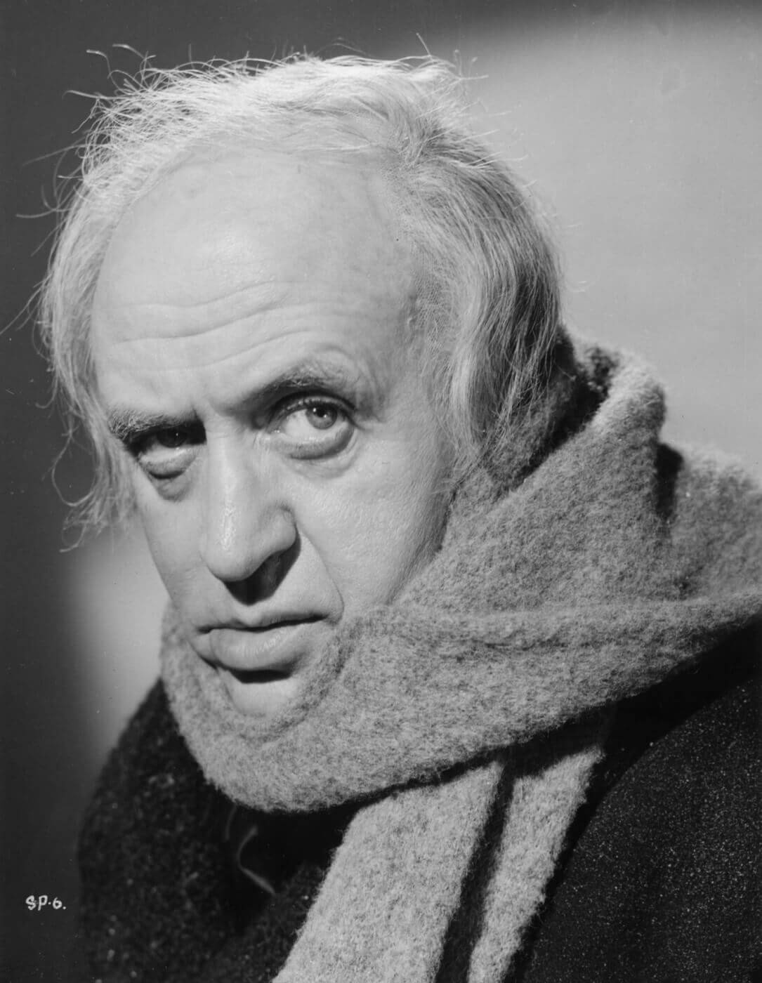 Alistair Sim as Ebenezer Scrooge