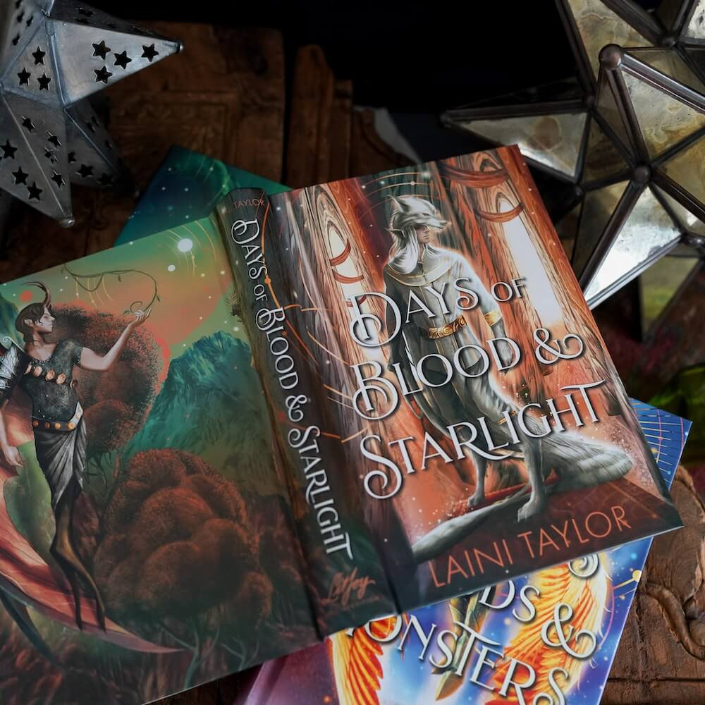 Front and back cover of Days of Blood and Starlight from DOSAB Special Edition Box Set