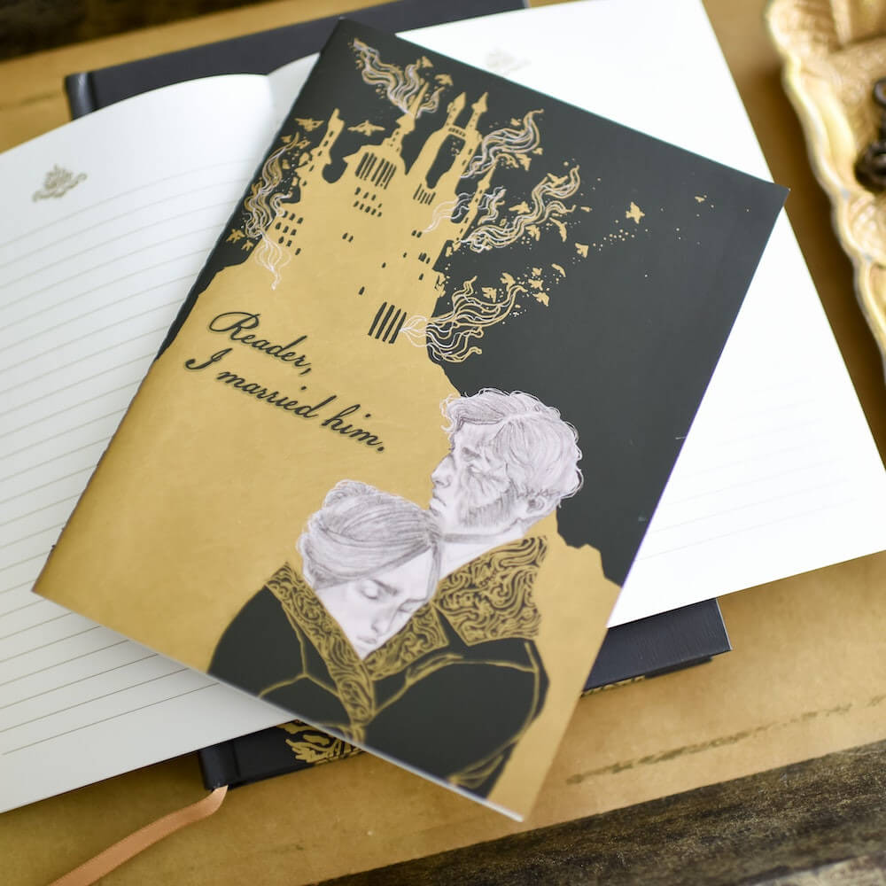 Jane Eyre and Edward Rochester embracing shown on the Jane Eyre notebook bundle sold by LitJoy