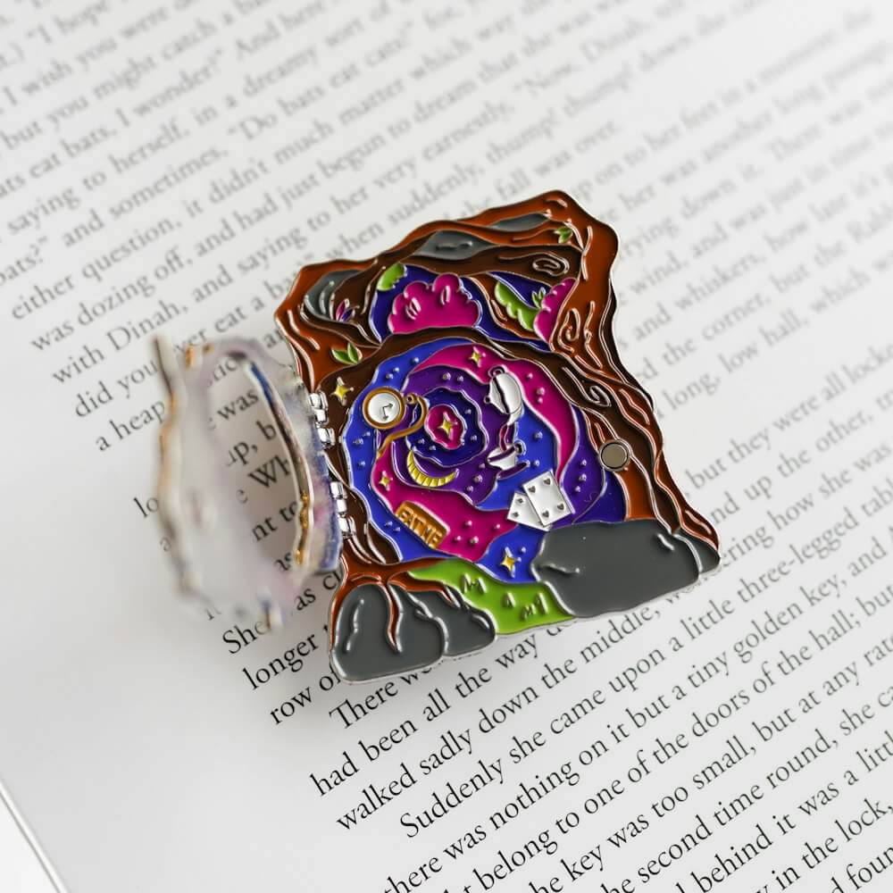 Alice in Wonderland Literary Window Enamel Pin shows the White Rabbit peering into the rabbit hole to Wonderland.