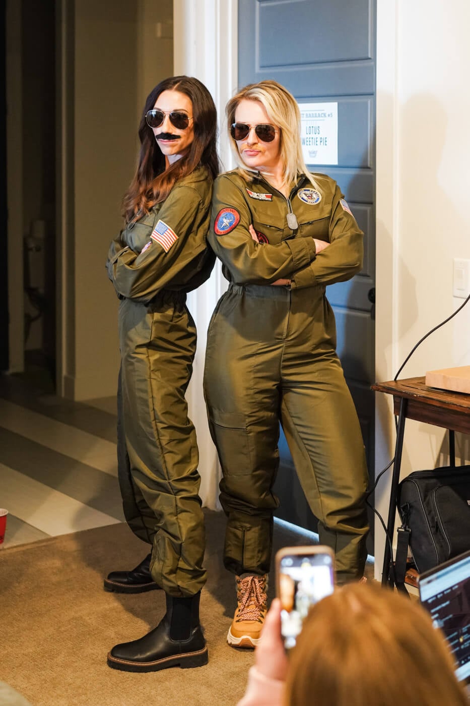 Kelly and Alix, founders of LitJoy in flight school uniforms