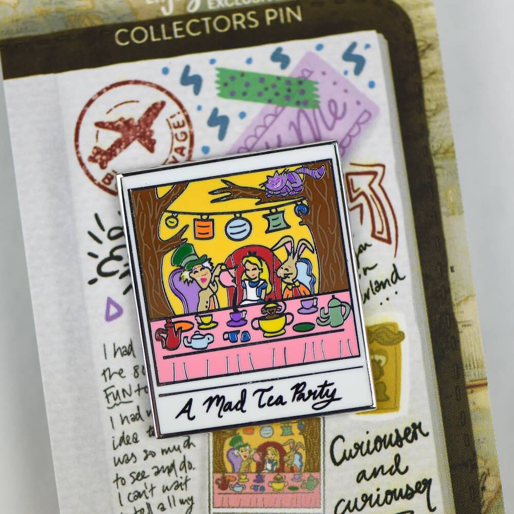 A Mad Tea Party enamel pin with Alice, the march hare, and the Mad Hatter