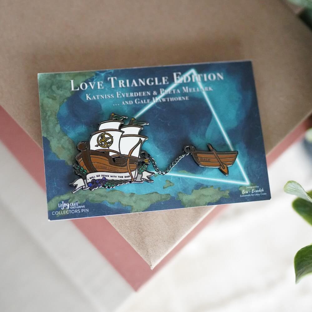 Katniss, Peeta, and Gale Ship Enamel Pin sold by LitJoy Crate