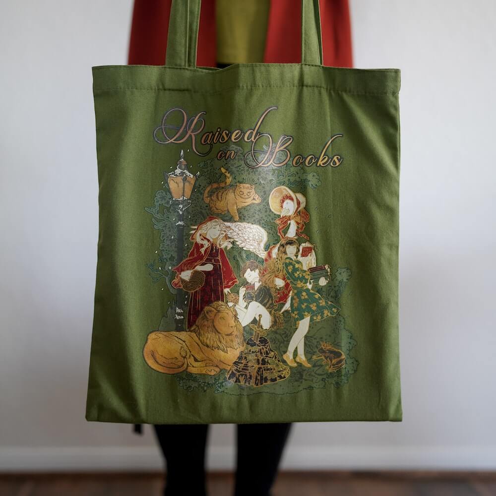 Raised on Books Tote featuring storybook characters in green, gold, and red colors.