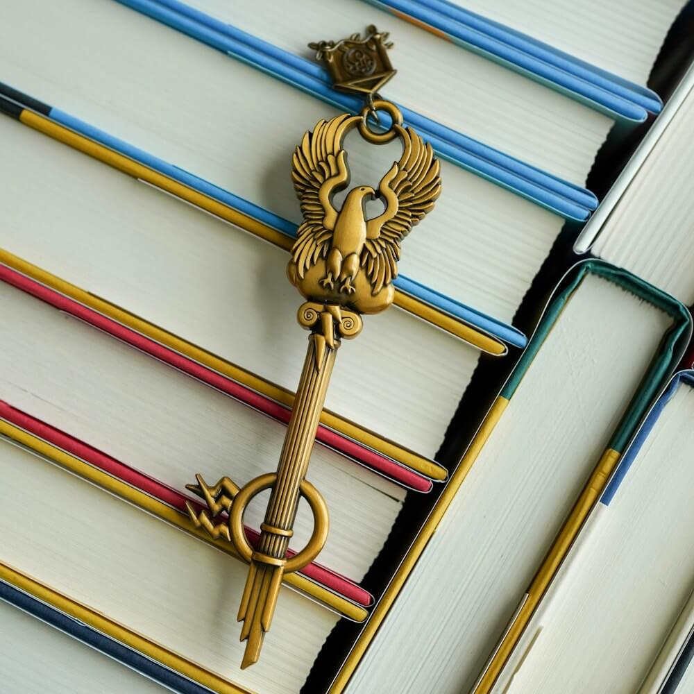 Zeus Greek Mythology Key has an eagle with spread wings, a Greek column body and lightning bolts as the key's teeth.